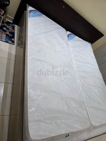 Double bed frame with headboard and mattress (used) - dark wood with delivery