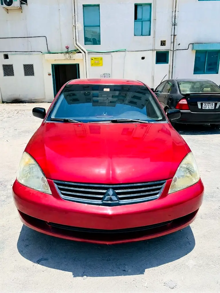 Mitsubishi Lancer 2010 — photo 1 of 8