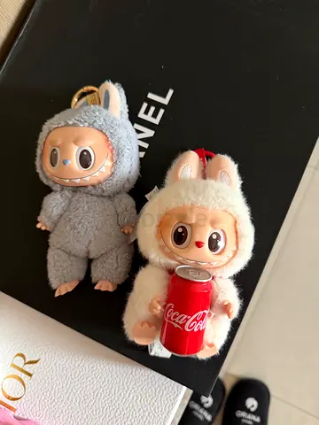 Two Monchhichi Plush Keychain Dolls (one holding mini Coke can) labubu