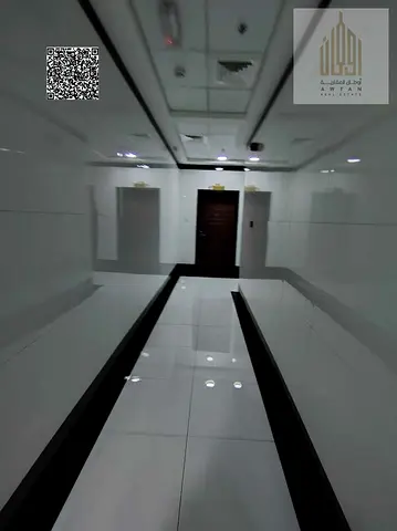 Tower for sale in Al Nahda, boasting a strategic location and high-end, deluxe finishing. Entire building for sale in Al Nahda Residential Complex, A