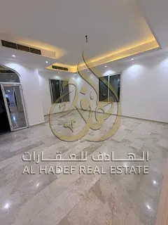 Super luxury villa for annual rent in Hoshi Sharjah, 5 master bedrooms, spacious living hall and maj