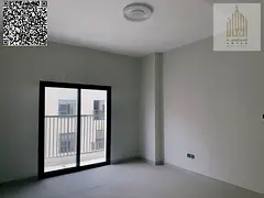 partment for sale Installme in Kintia Residence, Ajman Uptown. Two bedrooms and a living room. Prime
