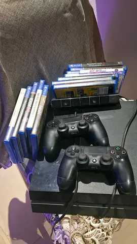 Sony PlayStation 4 Bundle with DualShock 4 Controllers and Games