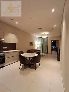 Live luxury in a rare, fully furnished apartment with an open view in the heart of Business Bay, ide