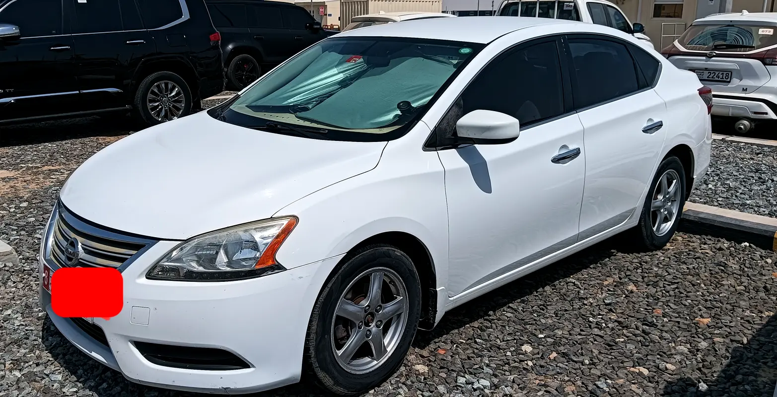 Nissan Sentra 2015 — photo 1 of 6