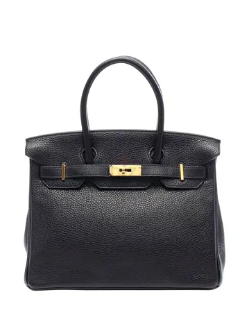 Hermès Birkin 30 in black Clemence leather featuring prominent gold hardware.