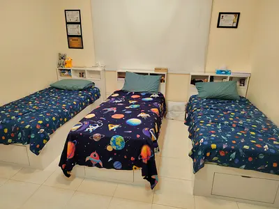 Three single beds with built-in storage and headboard shelving - set of 3