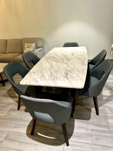 Marble-top dining table with 6 upholstered chairs - excellent condition