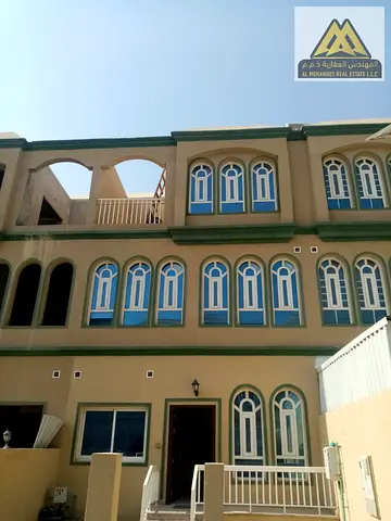 اب تاون فيلا بمنطقة الزاهية عجمان على شارع محمد بن زايد الرئيسي بجوار مركز القبائل وجميع الخدمات