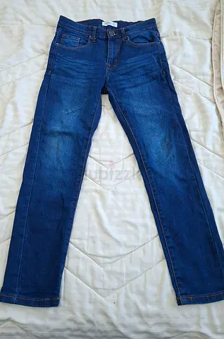 Boys dark-colored jeans, size 9 to 10 years
