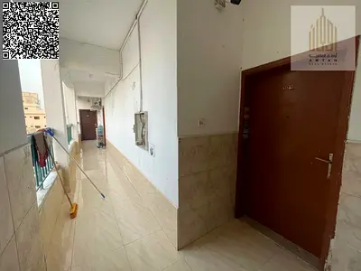 For sale, a residential-commercial building in Ajman Emirate, Liwara 1 area. The building is situated on a land area of 3,232 square feet and a built-