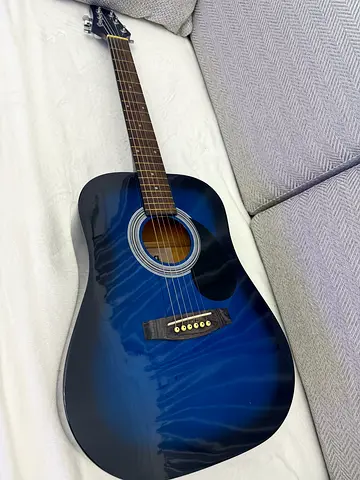 Blue Acoustic Guitar - almost new