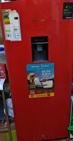My Hisense single-door red refrigerator with water dispenser - used, good condition