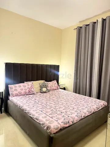 Big size upholstered bed with tall tufted headboard - dark grey