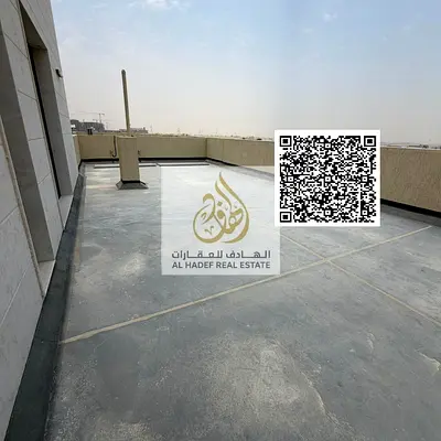 A one-bedroom apartment with a living room and a spacious roof terrace in Al Muntazah 2, featuring