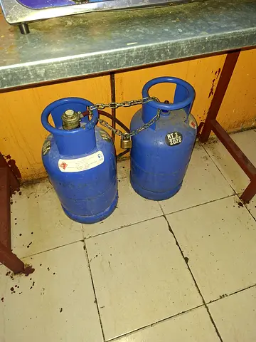 Two small blue LPG gas cylinders - used, good condition