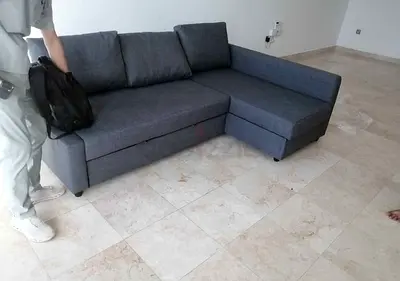 L-shaped grey fabric sofa with chaise - good condition