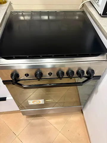 Stainless Steel Gas Range with Glass Cooktop - Good Condition