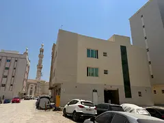 A room and a lounge in Qalia 26000