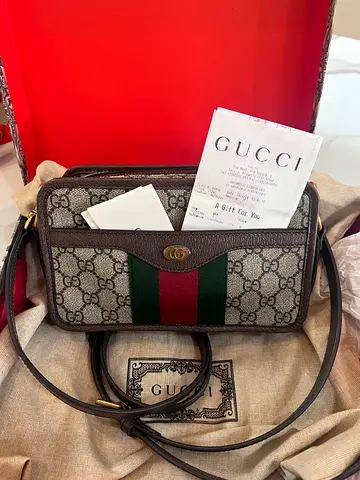 Gucci two way sling bag