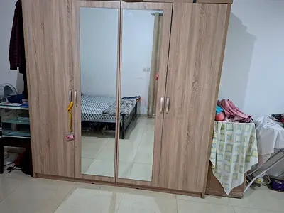 4-door wooden wardrobe with mirrored panels - good condition