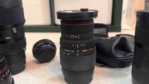 Sigma 70-300mm f/4-5.6 DG Zoom Lens (used) with caps and pouch