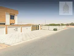 Two plots of land in Al Zahya Square project, including fees