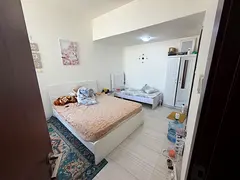 Master Bed room is available for rent in JVC prime location near circle Mall all included furnished