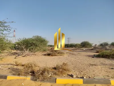 Prime Corner Industrial Plot for Sale in Al Sajaa with Main Road Frontage and 99-Year Usufruct