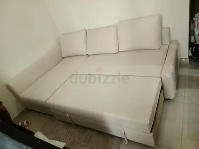Comfortable Cream L-Shaped Sofa Bed with Pull-Out Extension