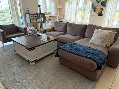 Large L-shaped fabric corner sofa with chaise, neutral brown - good condition