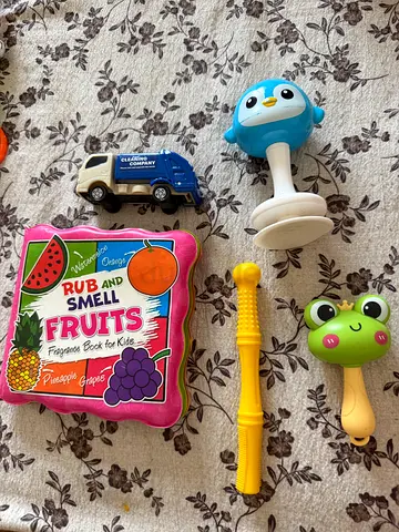 Mixed baby toys set — rattle, plush book, toy car and bath toys