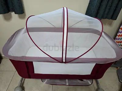 Baby bassinet with fabric seat - used, good condition