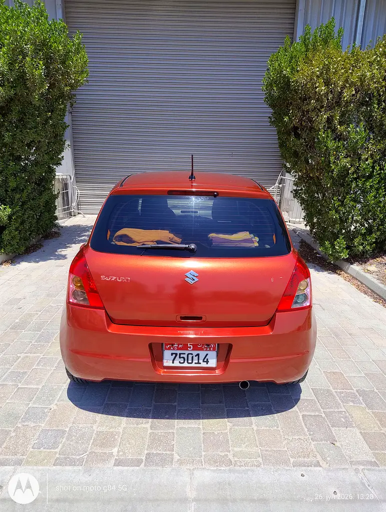 Suzuki Swift 2009 — photo 1 of 6