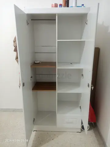 White 2-Door Wardrobe with Shelves and Hanging Rail - Good Condition