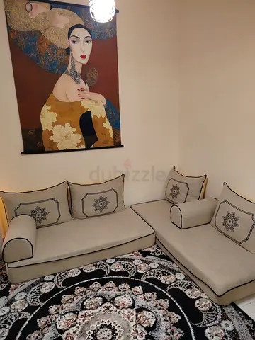 Beige L-shaped Floor Sofa Set with Decorative Cushions