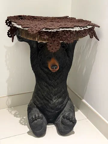 Bear-shaped carved wooden side table / decorative stool.
