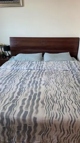 Queen wooden bed frame with headboard and bedside tables - good condition