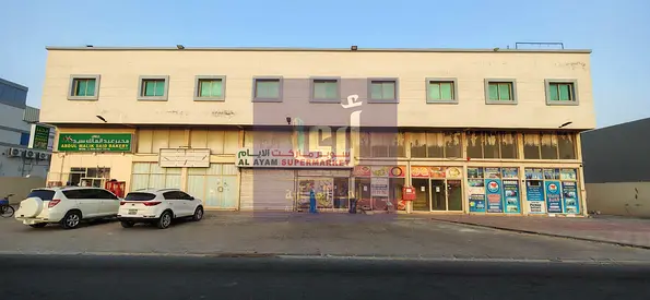 Mixed-Use Investment Building for Sale | 2 Warehouse Lands + 4 Shops + Residential Apartments | Al