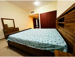Fully furnished master room with attached washroom available for family in Al khail gate