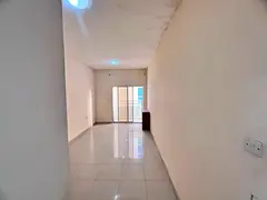 Studio apartment with a balcony offering a stunning view, central air conditioning, and ample natur