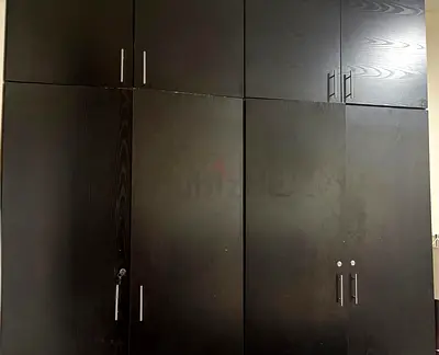 2 pieces of Large dark wood freestanding wardrobe with multiple compartments