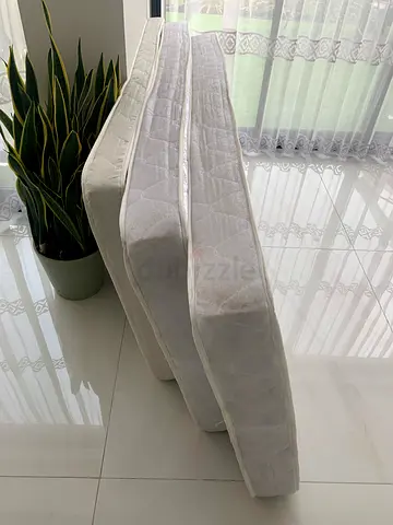 Two single mattresses - good condition, firm support