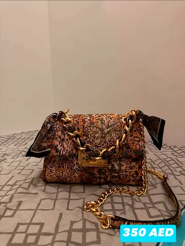 Aldo - Small patterned womens shoulder bag with gold chain strap - 350 AED