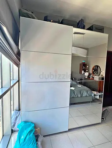 White sliding door wardrobe with mirrored panel - good condition