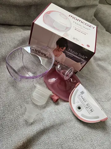 Momcozy breast pump accessories with sterilizer free delivery to mirdiff and alkhawneej .gently used