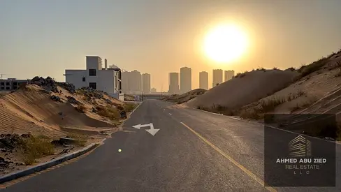 Corner Residential Land for Sale in Al Helio 2, Ajman – Prime Location Near Azha Project, Mosque & All Services, With Building Permit, 3 Streets Corne