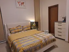 Two bedrooms, a living room, three bathrooms, with a swimming pool, gym, and two free parking spaces