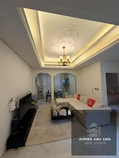 Luxurious one-bedroom apartment with a living room and majlis, fully furnished with high-end furnitu