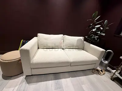 Light beige 2-seater sofa bed in perfect condition